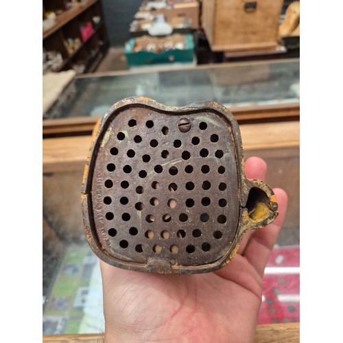 6 - A cast metal mechanical money bank.