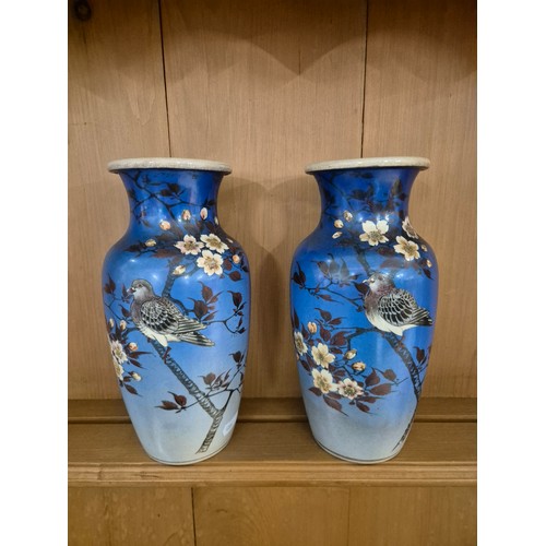 33 - A leather case containing a pair of Japanese vases, metronome and an Edwardian inlaid mahogany clock... 