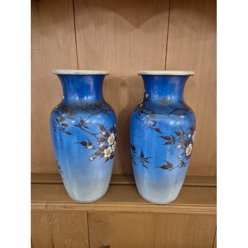 33 - A leather case containing a pair of Japanese vases, metronome and an Edwardian inlaid mahogany clock... 