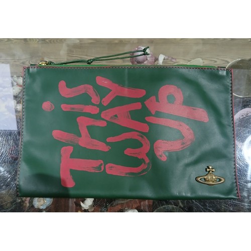 418 - Vivienne Westwood - This Way Up clutch bag 36cm x 23cm.
