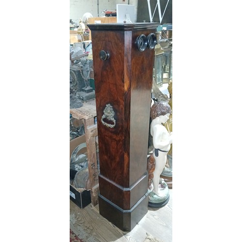 425 - A Victorian walnut floor standing stereoscopic viewer, partially filled with slides, height 121cm.