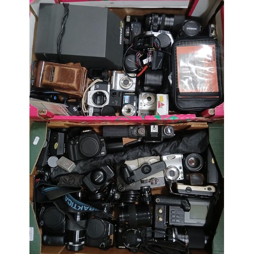 431 - Two boxes of assorted cameras/accessories.
