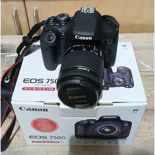 441 - A Canon EOS 750D DSLR with EFS 18mm-55mm lens.