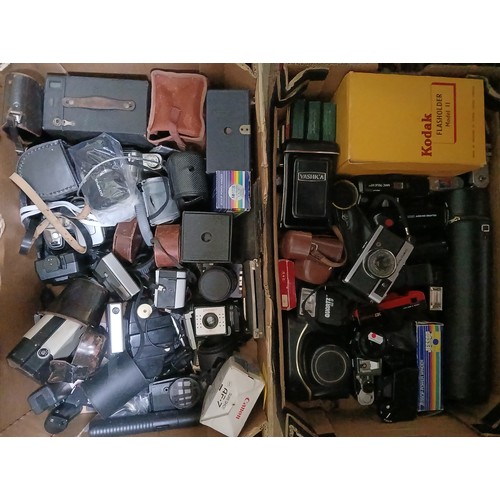 433 - Two boxes of assorted cameras/accessories.