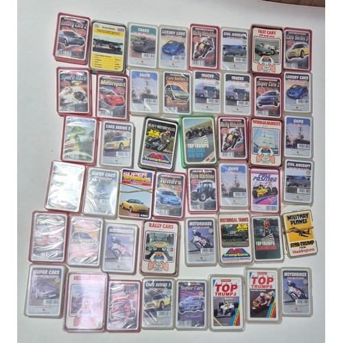 633 - A collection of assorted vintage Top Trumps & other similar cards games