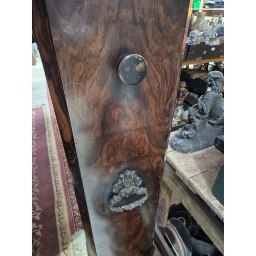 425 - A Victorian walnut floor standing stereoscopic viewer, partially filled with slides, height 121cm.