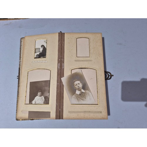 450 - A box of assorted photograph and postcard albums.