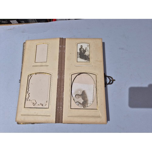 450 - A box of assorted photograph and postcard albums.