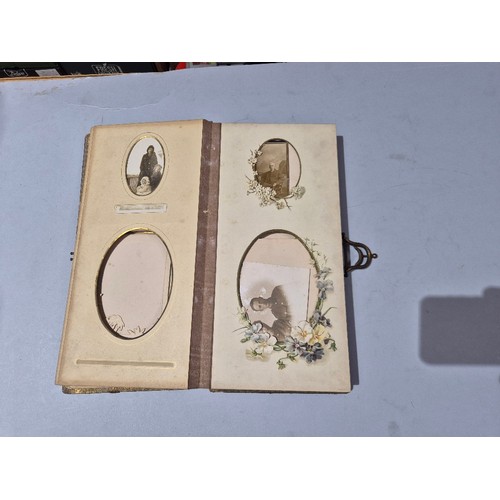450 - A box of assorted photograph and postcard albums.