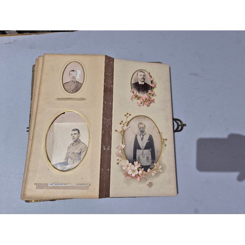 450 - A box of assorted photograph and postcard albums.