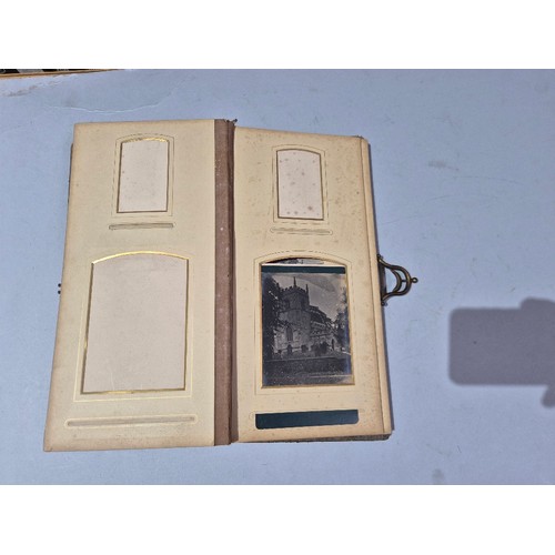 450 - A box of assorted photograph and postcard albums.