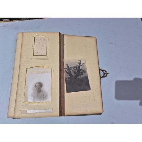 450 - A box of assorted photograph and postcard albums.