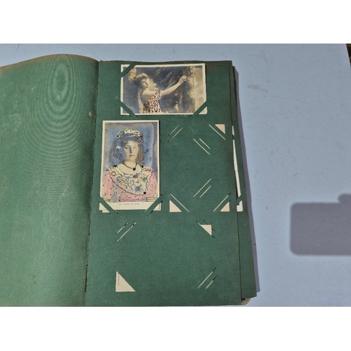 450 - A box of assorted photograph and postcard albums.