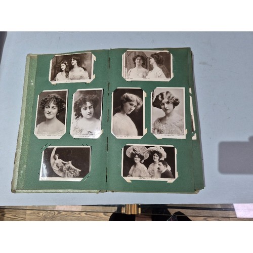 450 - A box of assorted photograph and postcard albums.