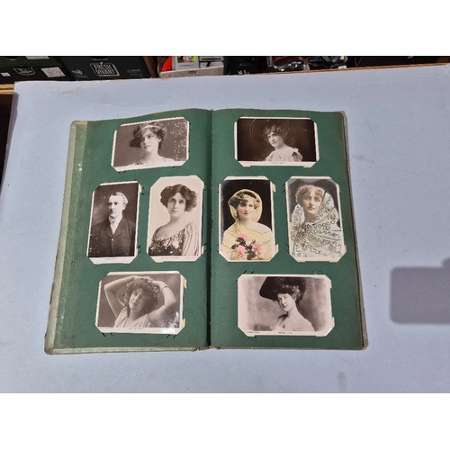 450 - A box of assorted photograph and postcard albums.