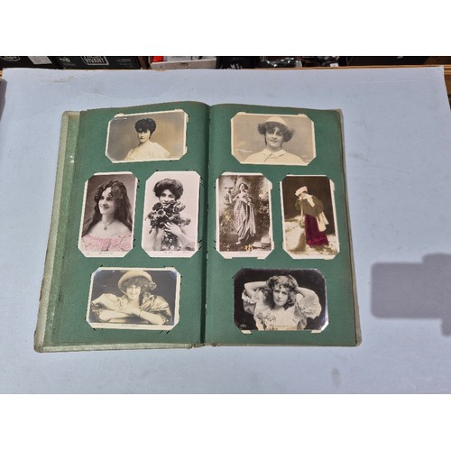 450 - A box of assorted photograph and postcard albums.