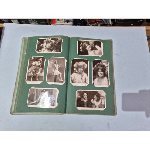 450 - A box of assorted photograph and postcard albums.