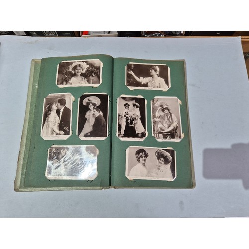 450 - A box of assorted photograph and postcard albums.
