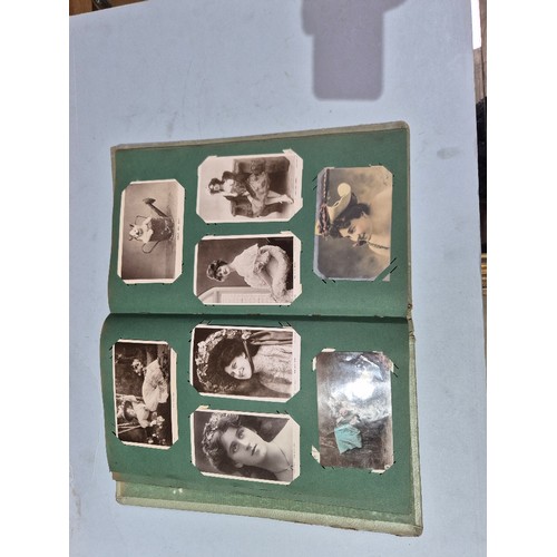 450 - A box of assorted photograph and postcard albums.