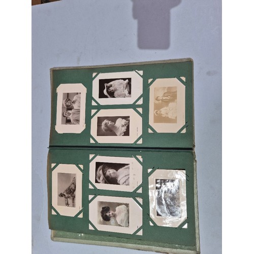 450 - A box of assorted photograph and postcard albums.