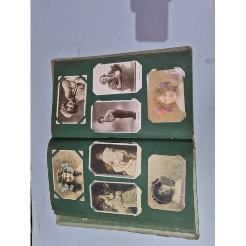450 - A box of assorted photograph and postcard albums.