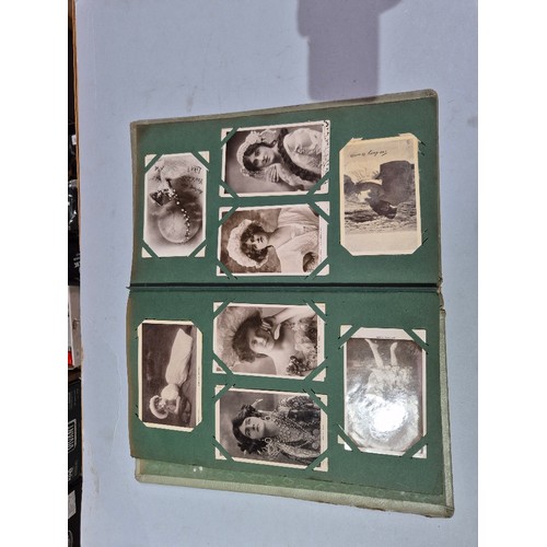450 - A box of assorted photograph and postcard albums.