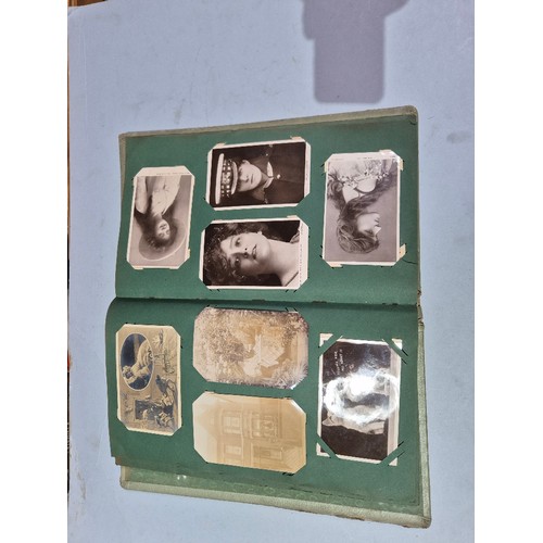 450 - A box of assorted photograph and postcard albums.