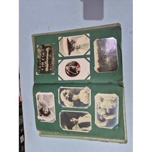 450 - A box of assorted photograph and postcard albums.
