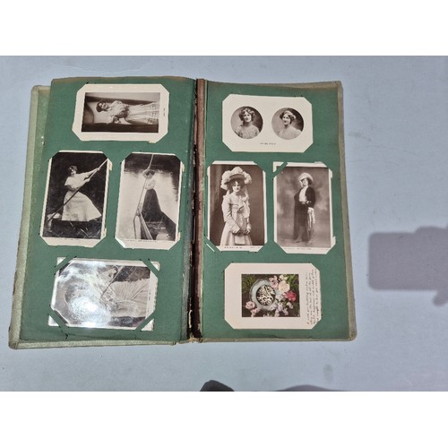 450 - A box of assorted photograph and postcard albums.