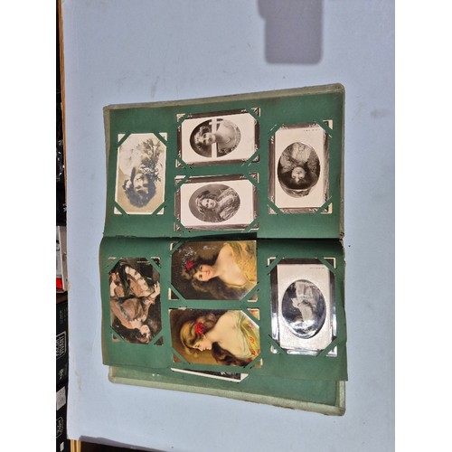 450 - A box of assorted photograph and postcard albums.