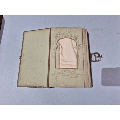 450 - A box of assorted photograph and postcard albums.