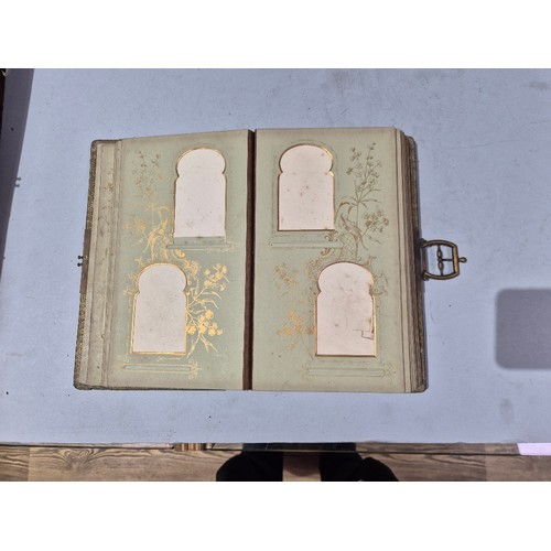 450 - A box of assorted photograph and postcard albums.