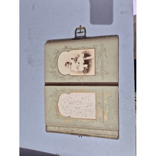 450 - A box of assorted photograph and postcard albums.