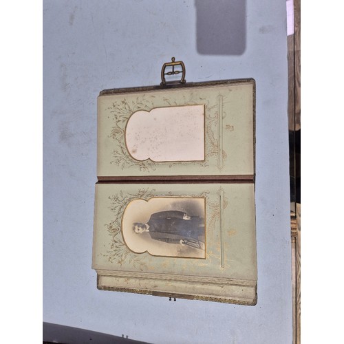 450 - A box of assorted photograph and postcard albums.