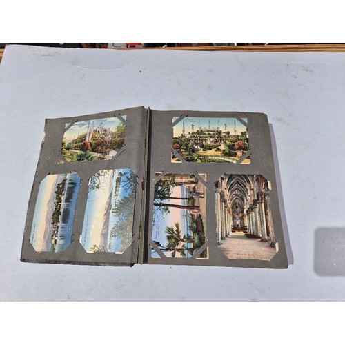 450 - A box of assorted photograph and postcard albums.