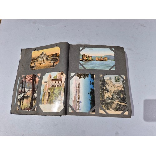 450 - A box of assorted photograph and postcard albums.