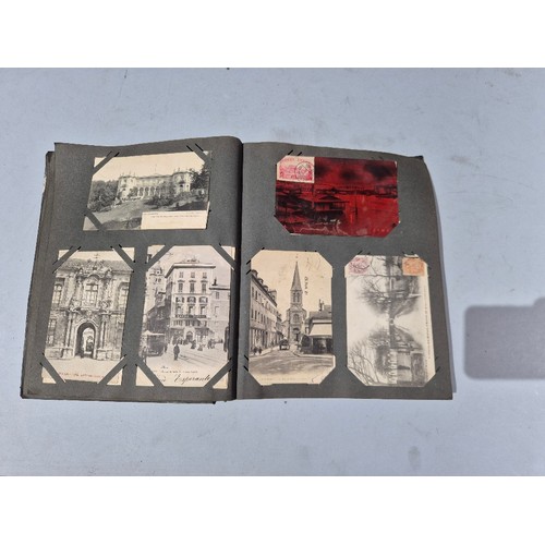450 - A box of assorted photograph and postcard albums.