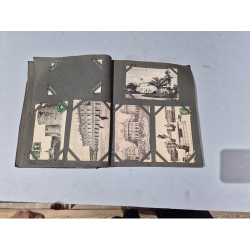 450 - A box of assorted photograph and postcard albums.