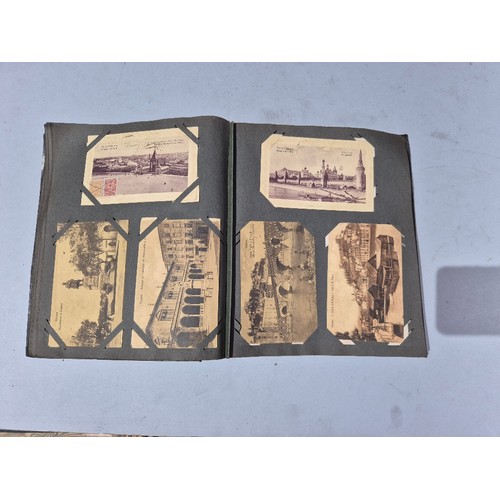 450 - A box of assorted photograph and postcard albums.