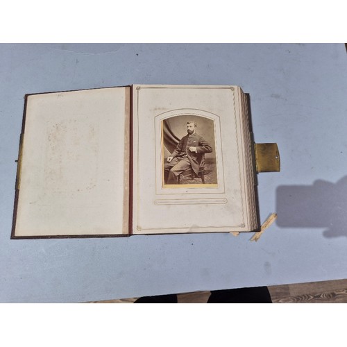 450 - A box of assorted photograph and postcard albums.