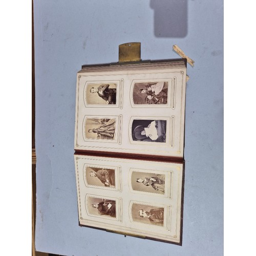 450 - A box of assorted photograph and postcard albums.