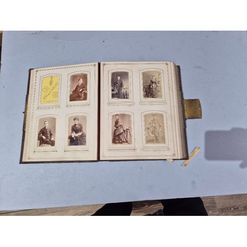 450 - A box of assorted photograph and postcard albums.