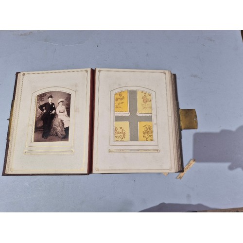 450 - A box of assorted photograph and postcard albums.