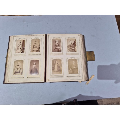 450 - A box of assorted photograph and postcard albums.