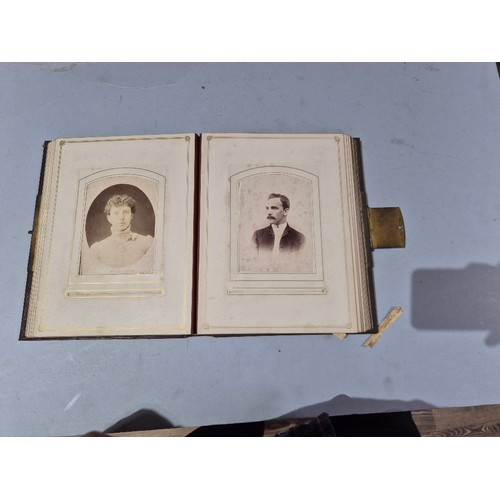 450 - A box of assorted photograph and postcard albums.
