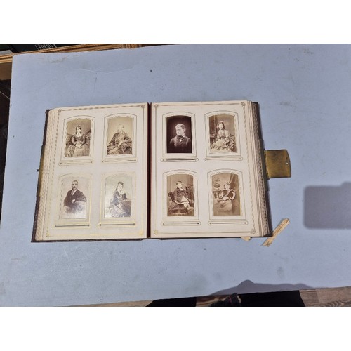 450 - A box of assorted photograph and postcard albums.