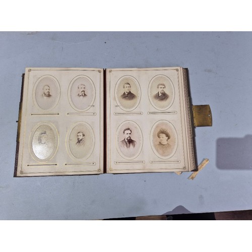 450 - A box of assorted photograph and postcard albums.