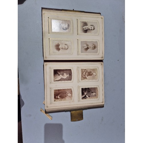 450 - A box of assorted photograph and postcard albums.