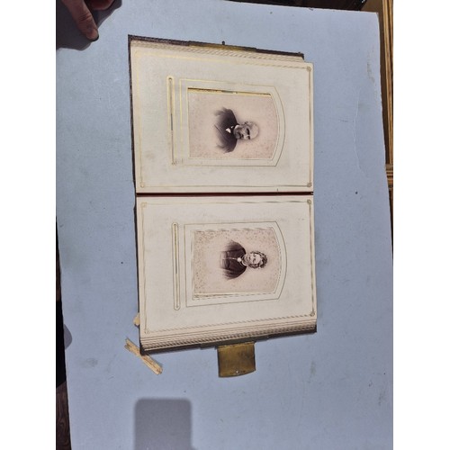 450 - A box of assorted photograph and postcard albums.