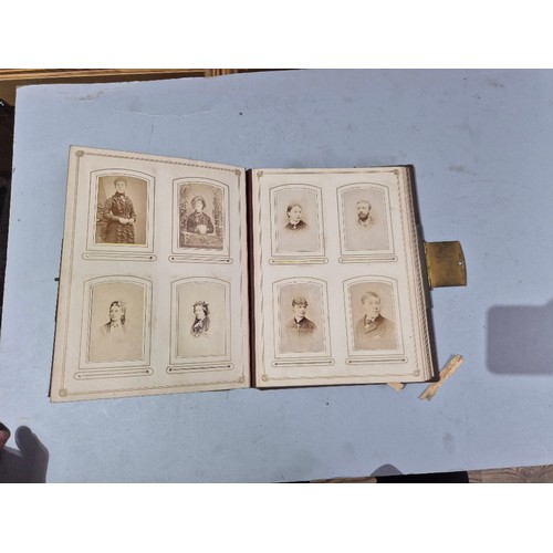 450 - A box of assorted photograph and postcard albums.